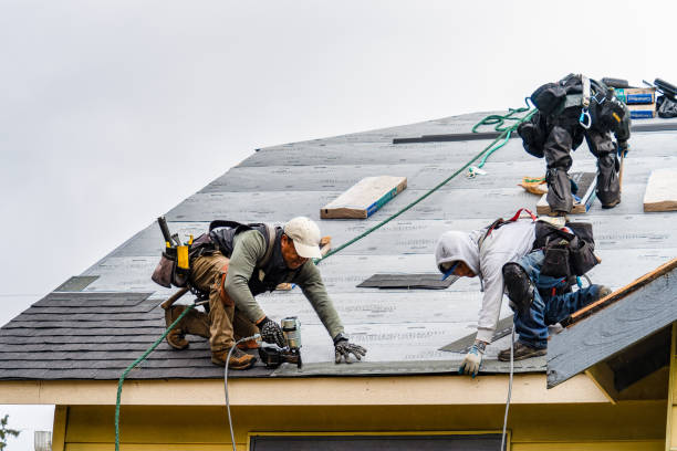 Professional Gutter Installation technician working in Pomona, CA